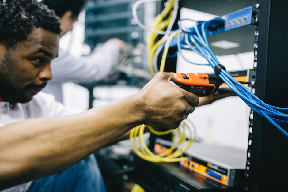 A diverse group of electrical engineers collaborating on a project.